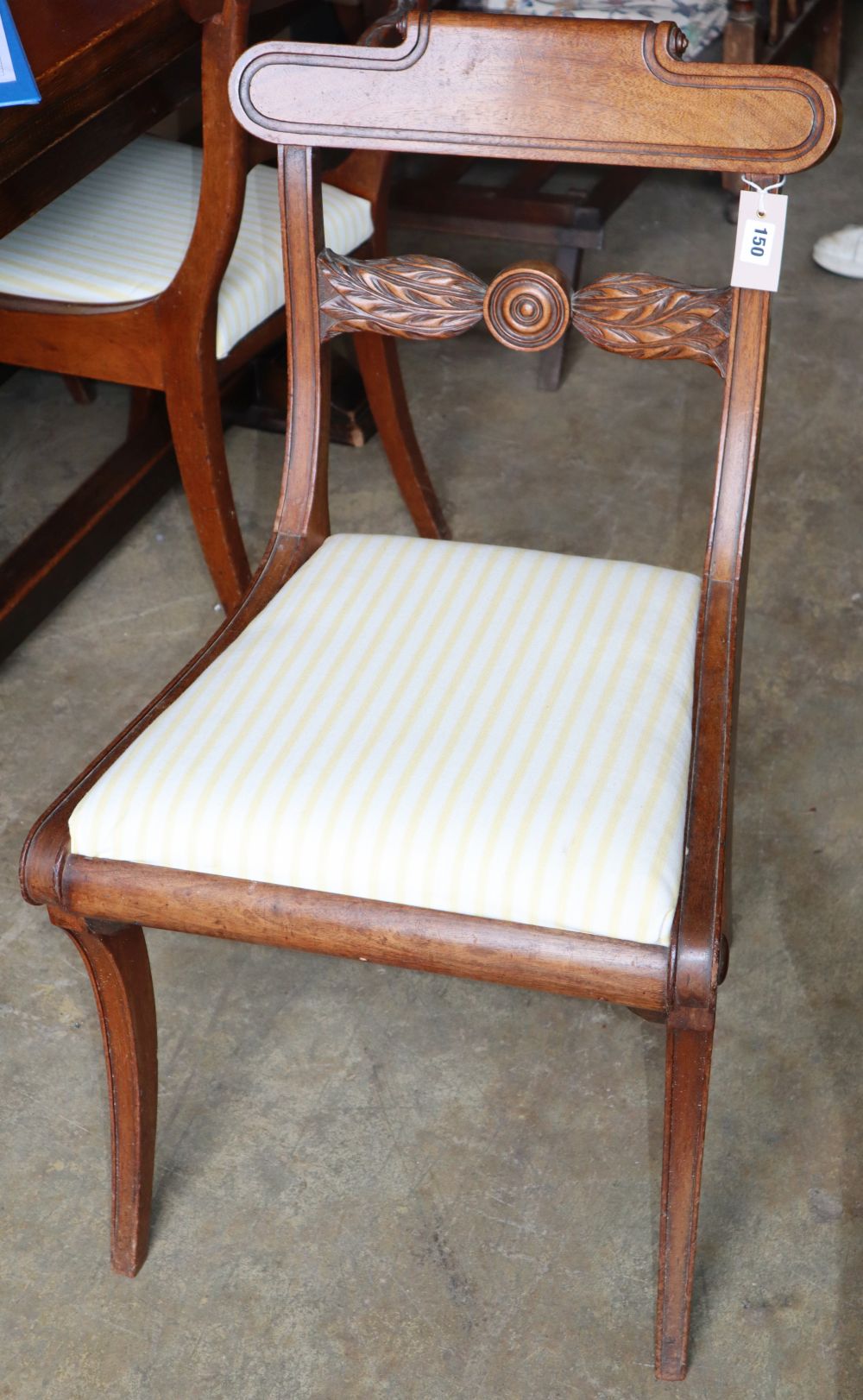 A set of six Regency provincial mahogany dining chairs